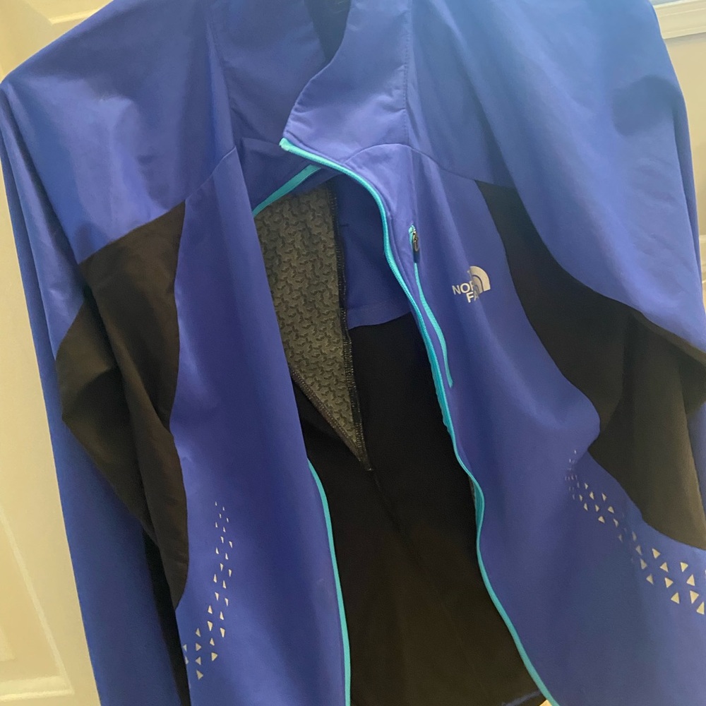 The North Face Purple and Black Jacket with Teal Zipper